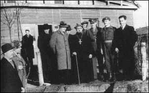 CURB representatives visiting the Ukrainian displaced persons camp in Heidenau, Germany. December 1945